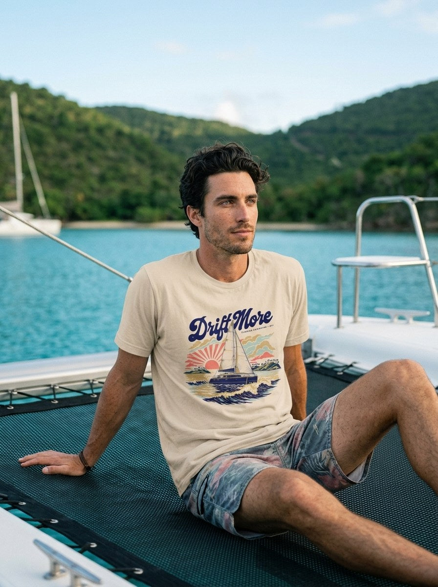 Catamaran BVI Tee in Natural worn on a catamaran trampoline in the islands