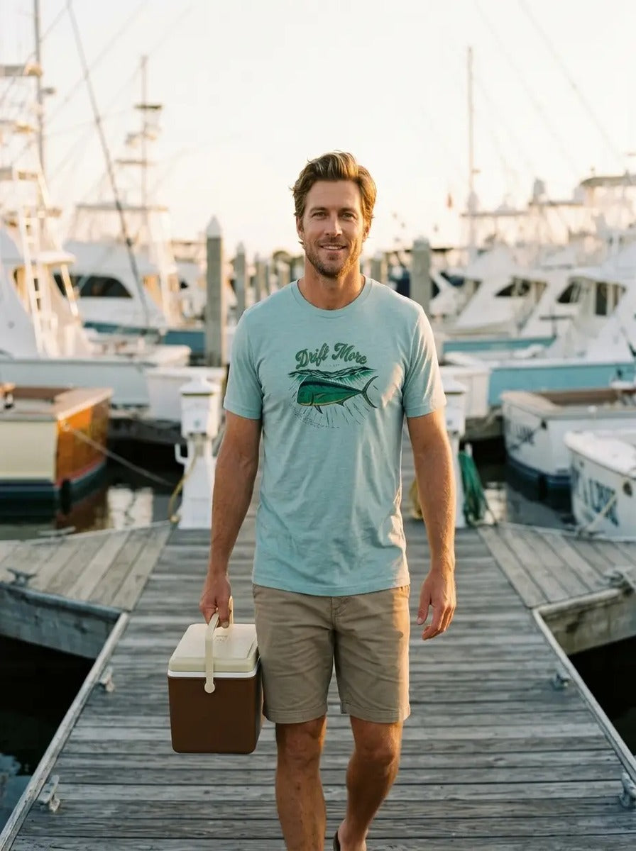 Mahi Lit Up Tee in Heather Prism Ice Blue worn walking a marina dock